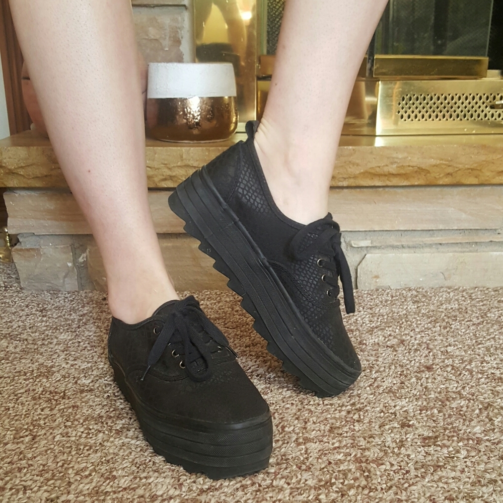 Black platform sneakers